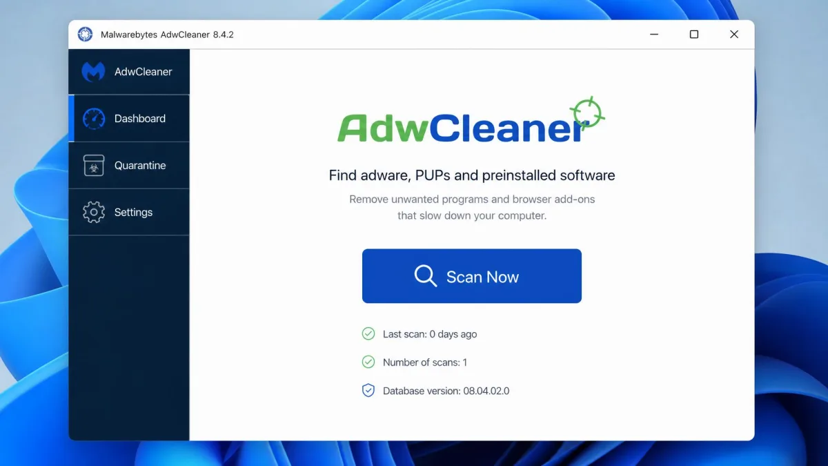 AdwCleaner's single main window on Windows 11, showing the large Scan Now button in the centre with the Dashboard, Quarantine and Settings tabs down the left edge.