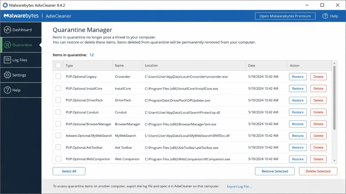 AdwCleaner's quarantine manager listing quarantined detections with restore and delete options.