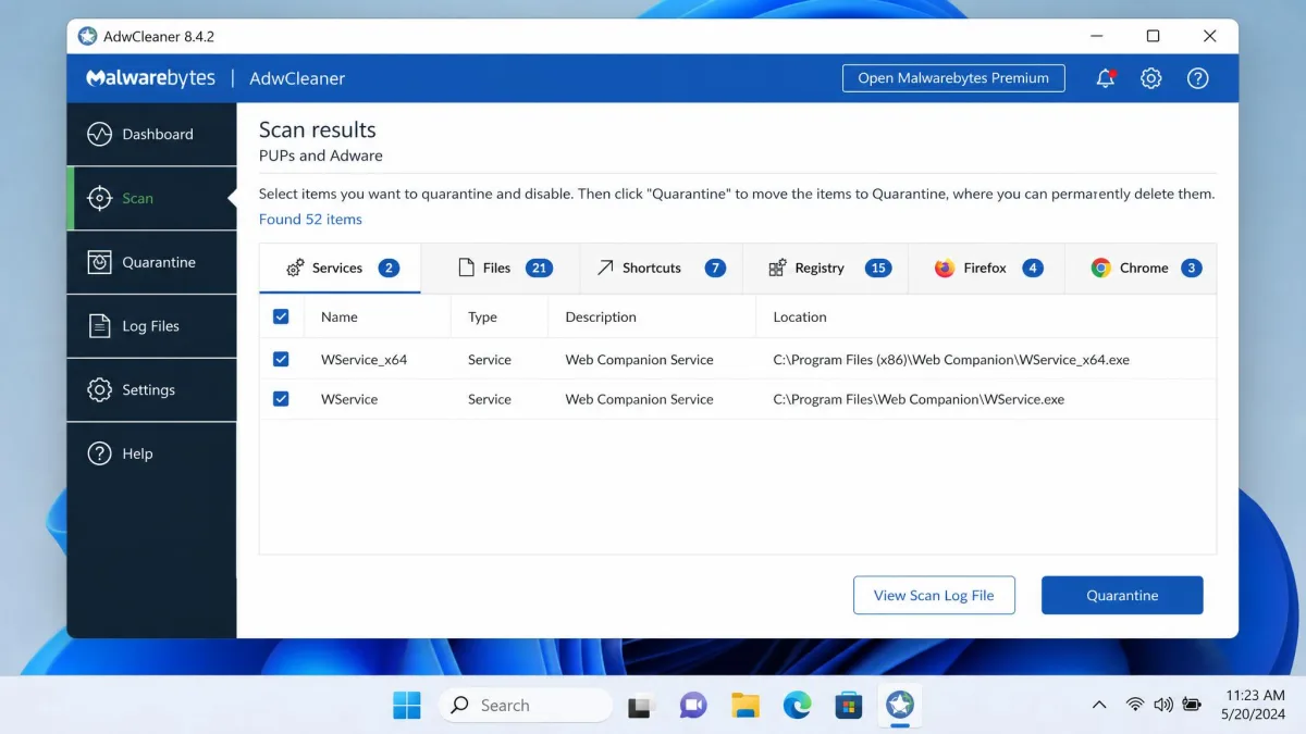 AdwCleaner's scan results screen on Windows 11 with detections grouped into tabs for Services, Files, Shortcuts, Registry, Firefox and Chrome.