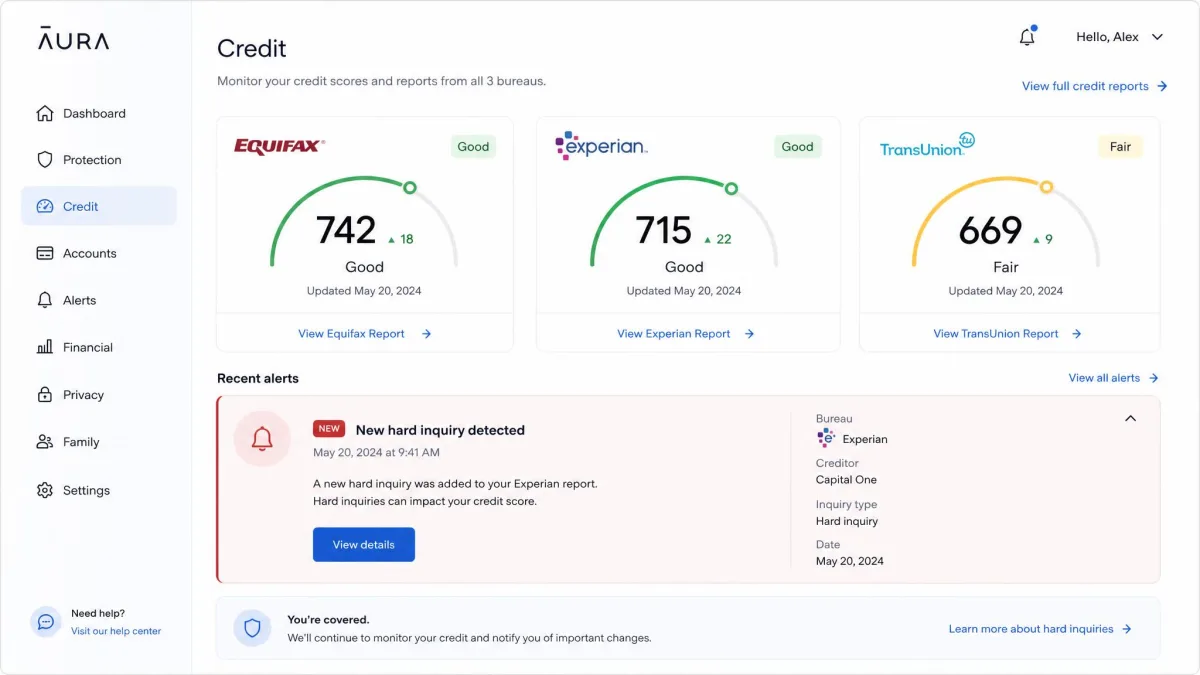 Aura's credit monitoring screen showing separate Equifax, Experian and TransUnion score panels with a recent alert about a new hard inquiry.