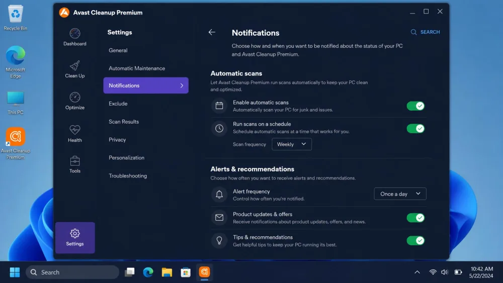 The Avast Cleanup Premium notifications and maintenance settings screen showing toggles for automatic scans and alert frequency on a Windows desktop.
