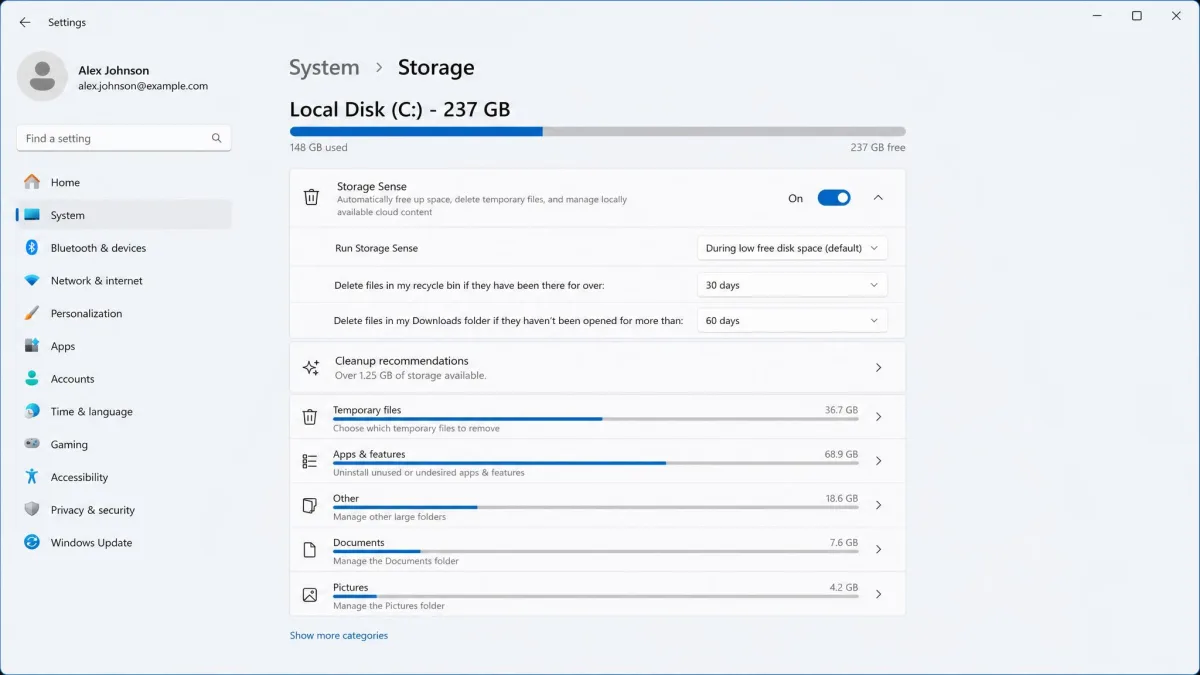 The Windows 11 Storage settings panel with Storage Sense toggled on, showing cleanup recommendations and a breakdown of space used by temporary files and apps.