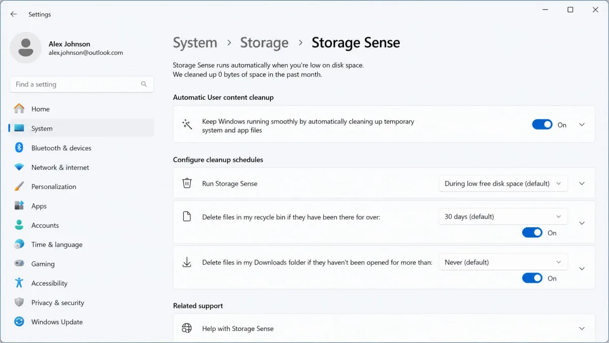 The Windows 11 Storage Sense settings page showing automatic temporary file cleanup and recycle bin scheduling toggles switched on.
