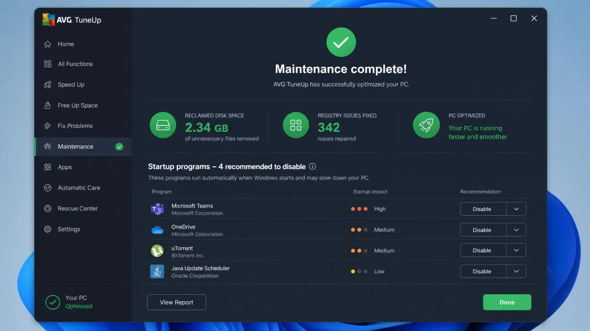 AVG TuneUp's completed maintenance screen on Windows 11, showing reclaimed disk space, the number of registry issues fixed and a list of startup programs it recommends disabling.