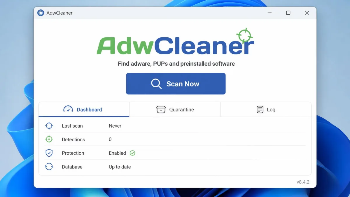 The AdwCleaner main window on Windows 11, showing the single large Scan Now button, the Dashboard, Quarantine and Log tabs, and the version number in the corner.