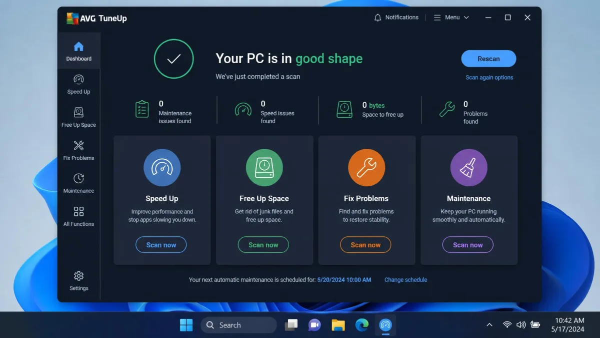 The AVG TuneUp dashboard on Windows 11 showing the Speed Up, Free Up Space, Fix Problems and Maintenance tiles with a scan summary across the top.
