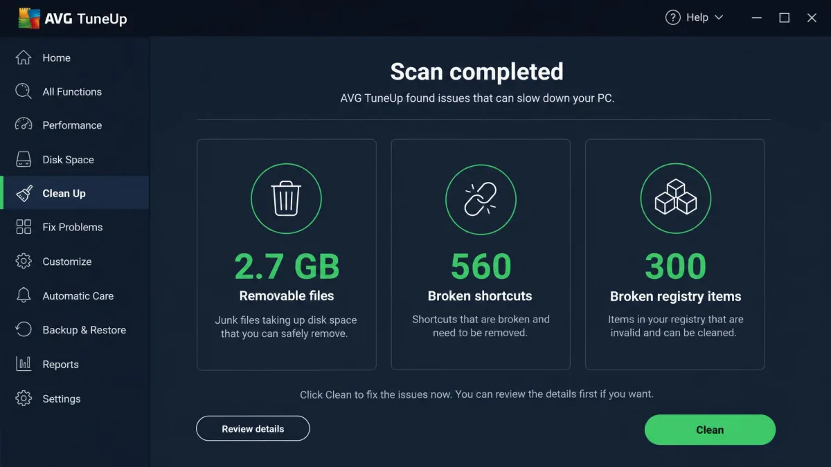 AVG TuneUp scan results screen listing 2.7GB of removable files, 560 broken shortcuts and 300 broken registry items, with the green Clean button in the lower right.