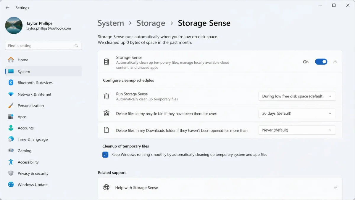 Windows 11 Storage Sense settings page with automatic cleanup switched on, showing schedule options for temporary files and Recycle Bin contents.