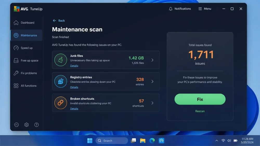 AVG TuneUp's Maintenance scan results screen on Windows 11, showing categories for junk files, registry entries, and broken shortcuts with a large Fix button on the right.