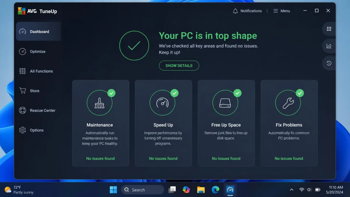 AVG TuneUp's main dashboard on Windows 11 showing the Maintenance, Speed Up, Free Up Space and Fix Problems tiles with a green all-clear status banner.