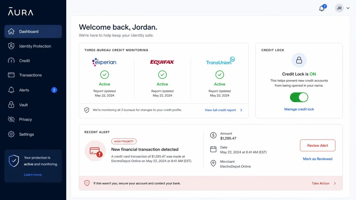 Aura's identity protection dashboard showing three-bureau credit monitoring status, a credit lock toggle and a recent financial transaction alert.