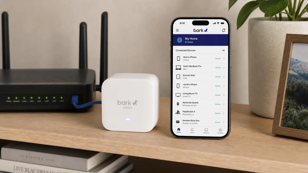 The small white Bark Home device plugged into a home router on a shelf, with a phone beside it showing the connected devices list in the Bark app.