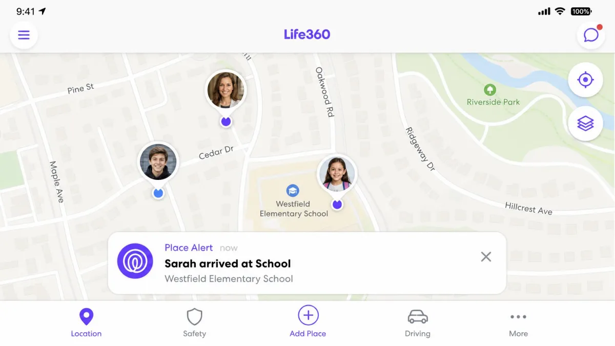 The Life360 map screen with three family member pins on a neighbourhood street map and a place alert notification reading that a child has arrived at school.