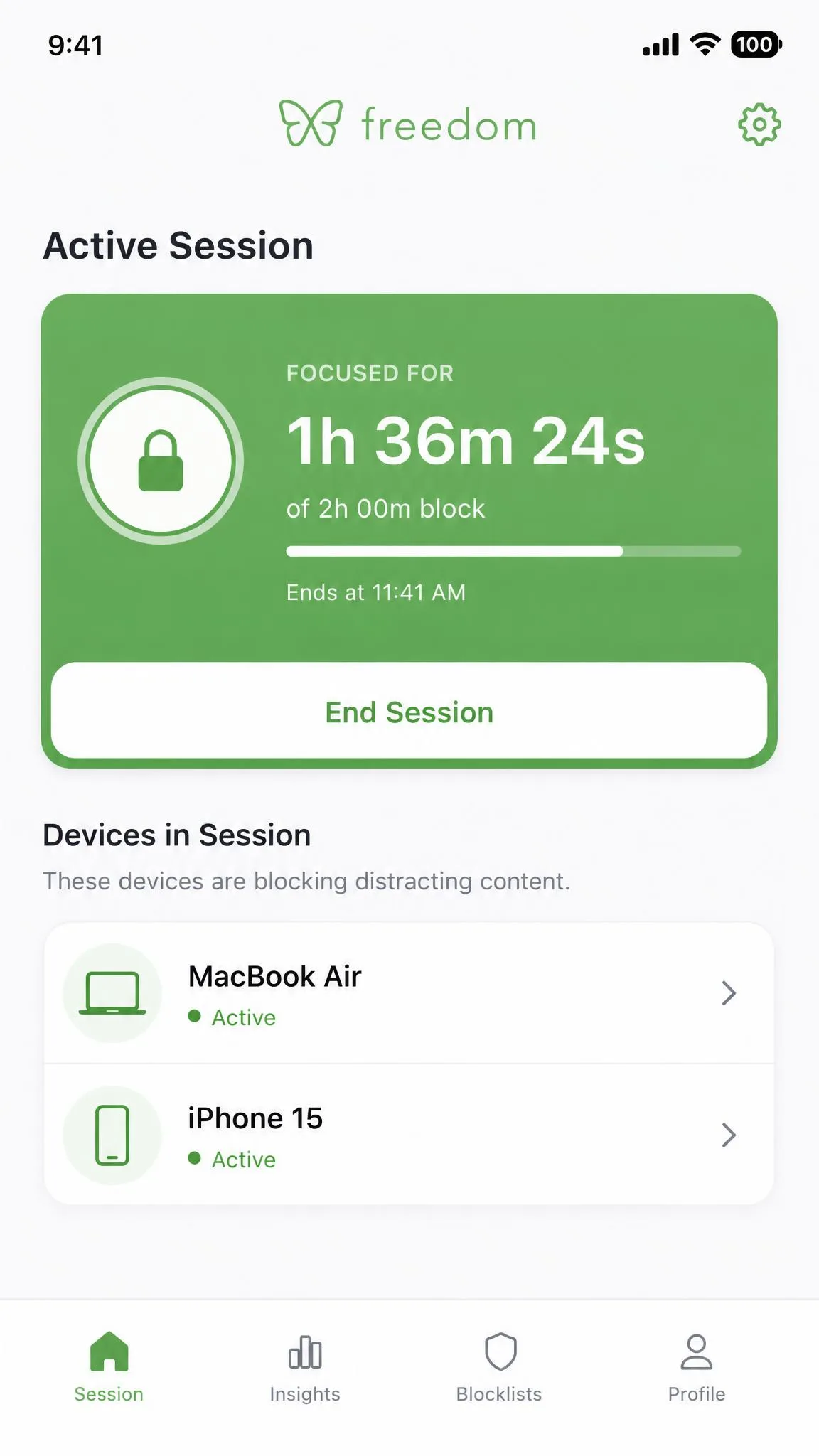 Freedom's Android session screen showing an active two-hour block with linked laptop and phone device icons listed underneath.
