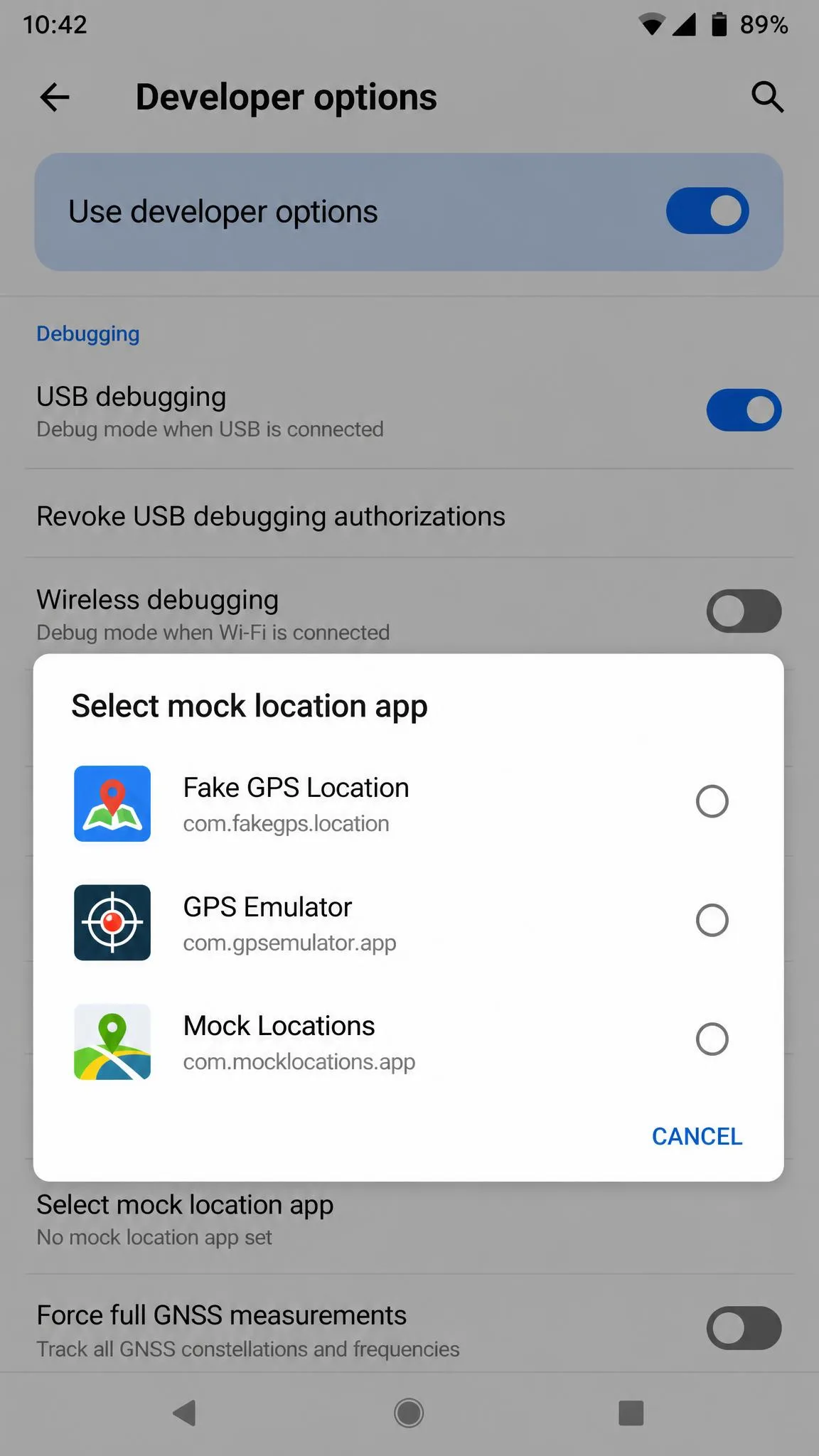 The Android Developer options screen showing the Select mock location app entry expanded, with three installed fake GPS apps listed as selectable providers.