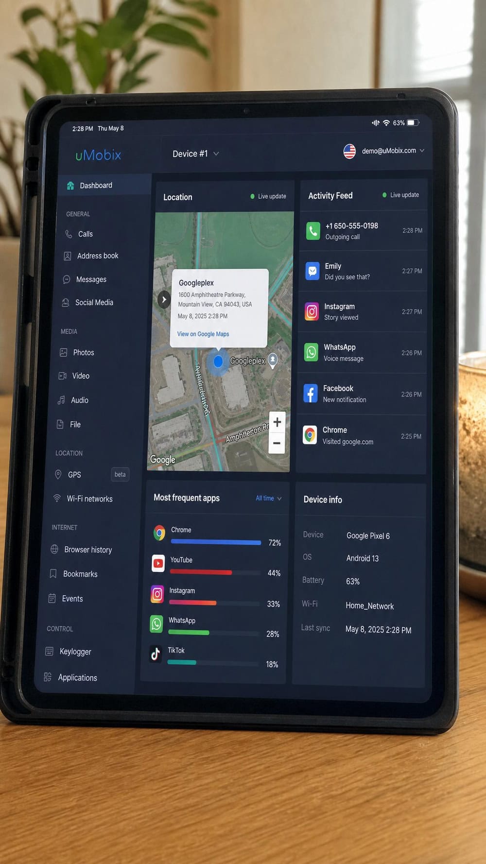 uMobix dashboard on a tablet showing a target Android phone's live GPS location, a frequently refreshing activity feed, and app-usage statistics in a multi-panel layout.