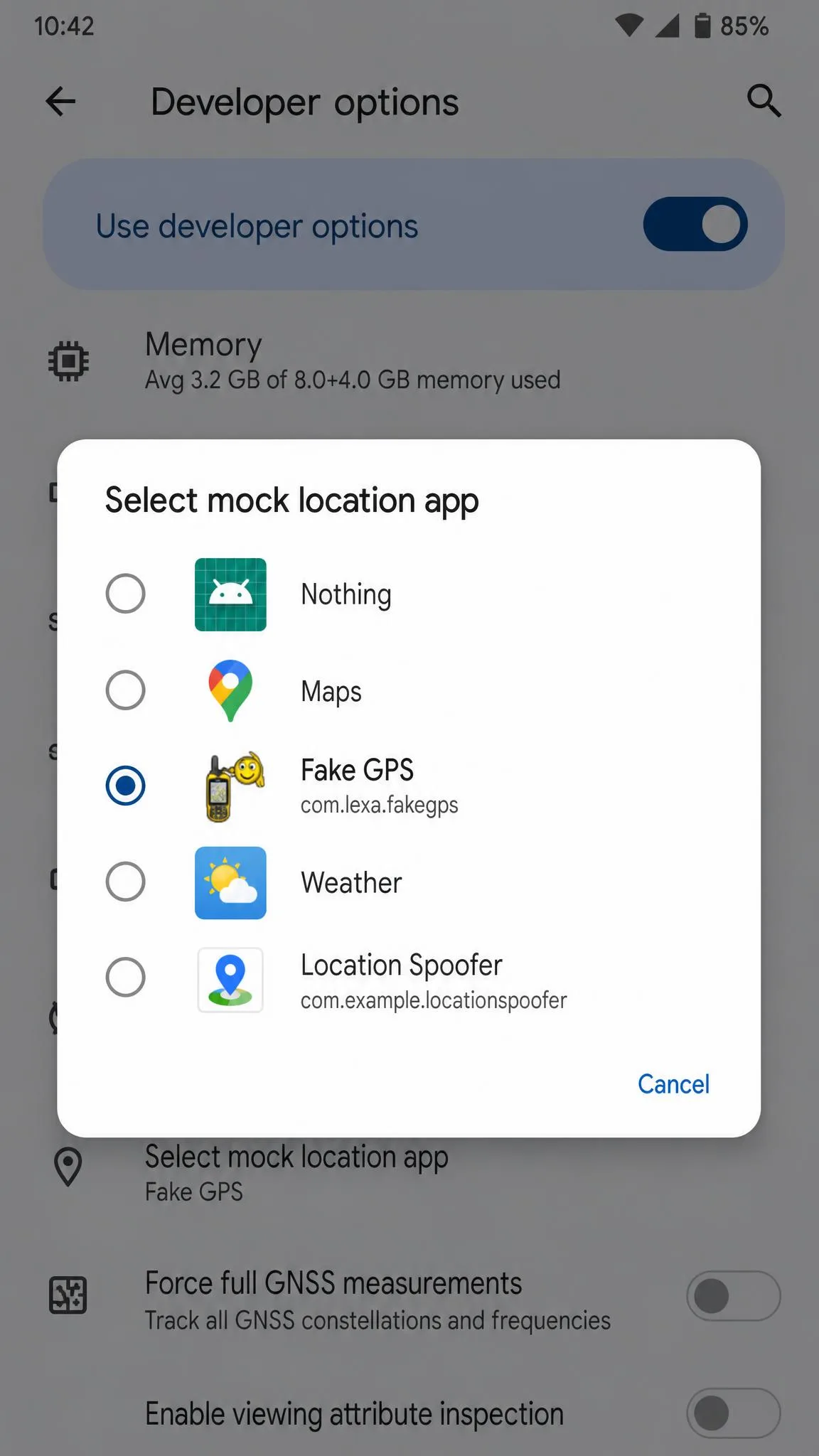 Android developer options settings screen with the Select mock location app entry open and a fake GPS app selected from the list of installed apps.
