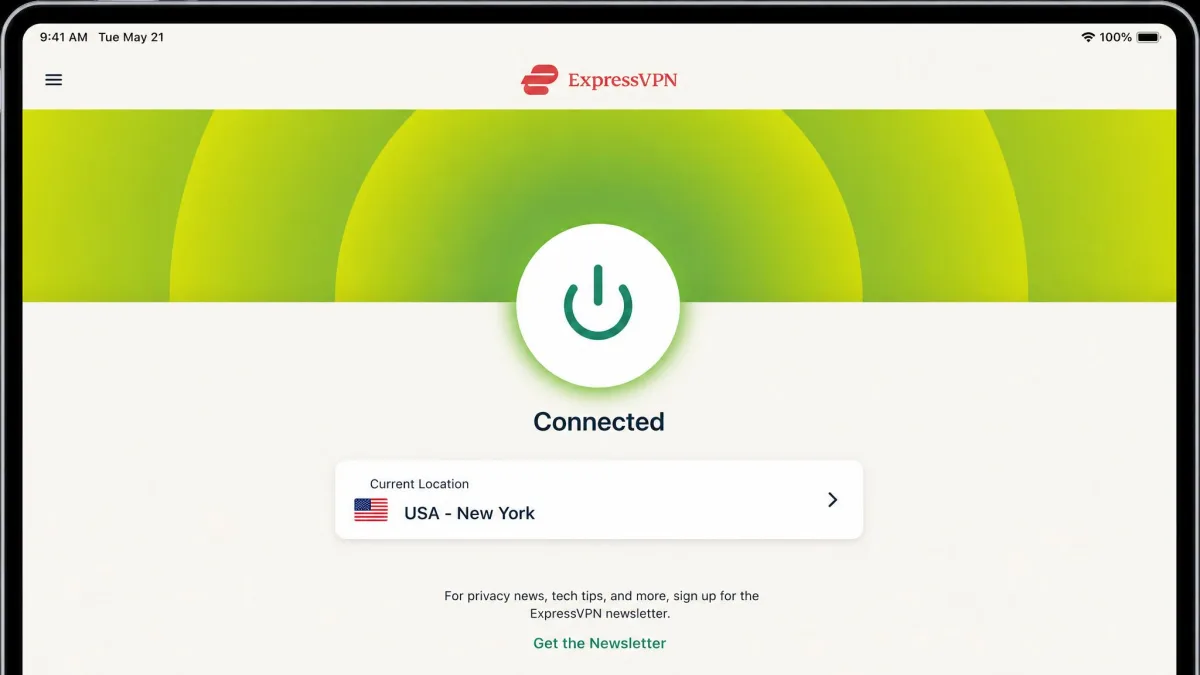 ExpressVPN iPad app showing its large central one-tap connect button in the connected green state with the chosen country listed below.