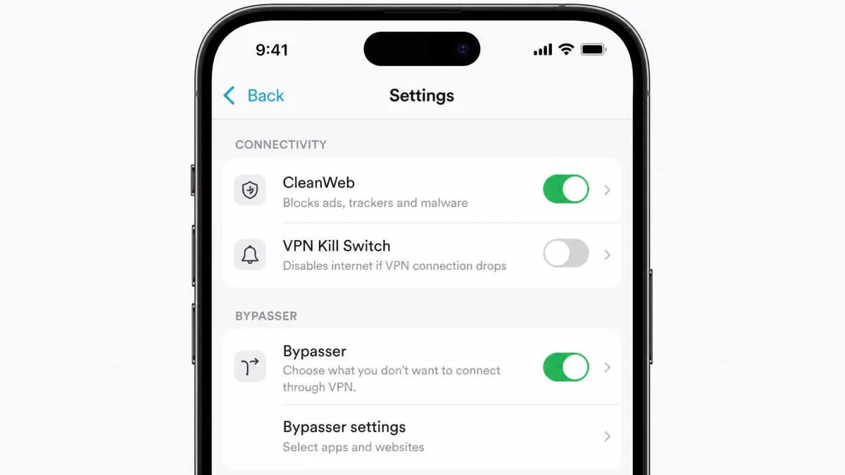 Surfshark's iOS app settings screen showing the CleanWeb ad blocker toggle and the Bypasser split-tunneling option enabled.