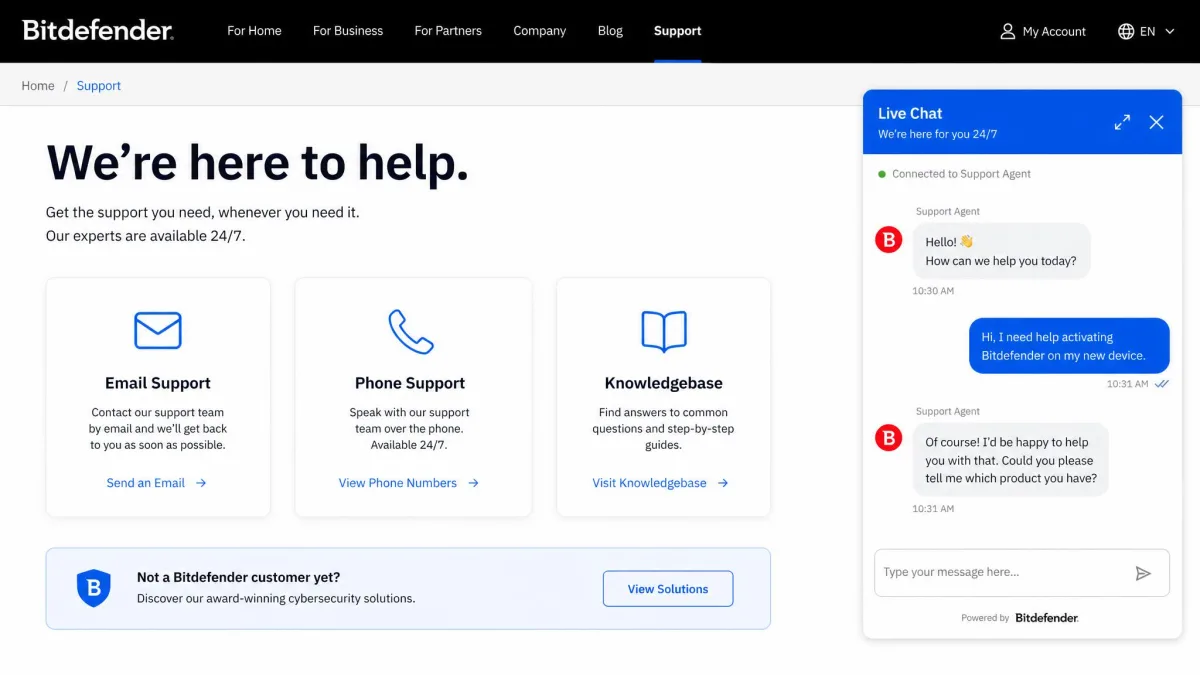 Bitdefender support page showing the 24/7 live chat window open next to links for email support, phone support, and the knowledgebase.