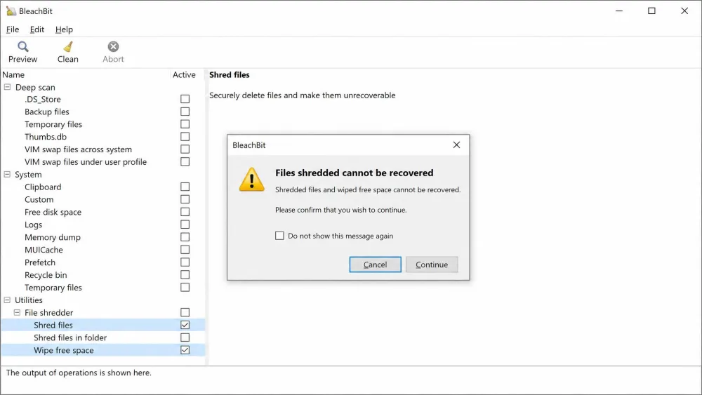 BleachBit's Shred Files and Wipe Free Space options selected, with a dialog warning that shredded files cannot be recovered.
