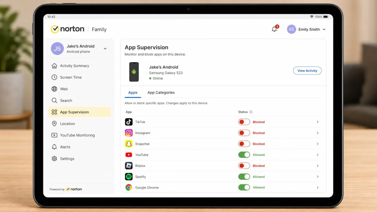 The Norton Family parent portal open on a tablet, showing the app supervision list for an Android phone with several apps toggled to blocked.