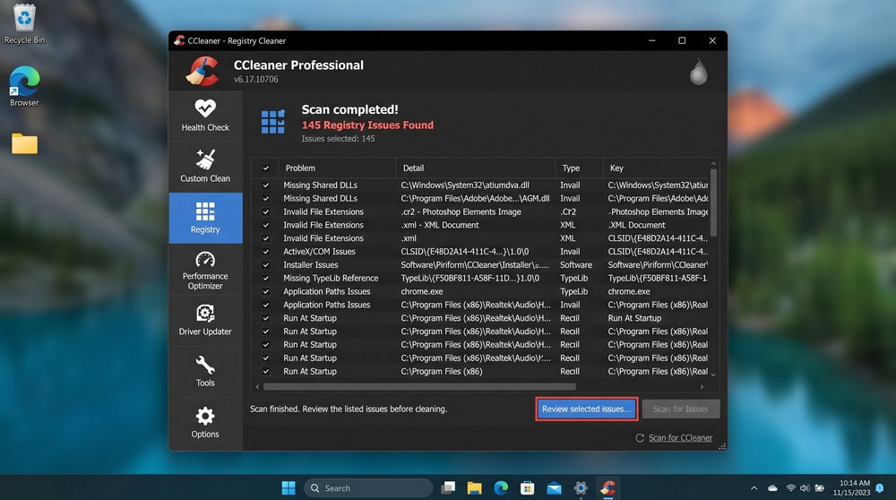 CCleaner Registry tab on Windows 11 showing a completed scan with a list of registry issues and a Review Selected Issues button.