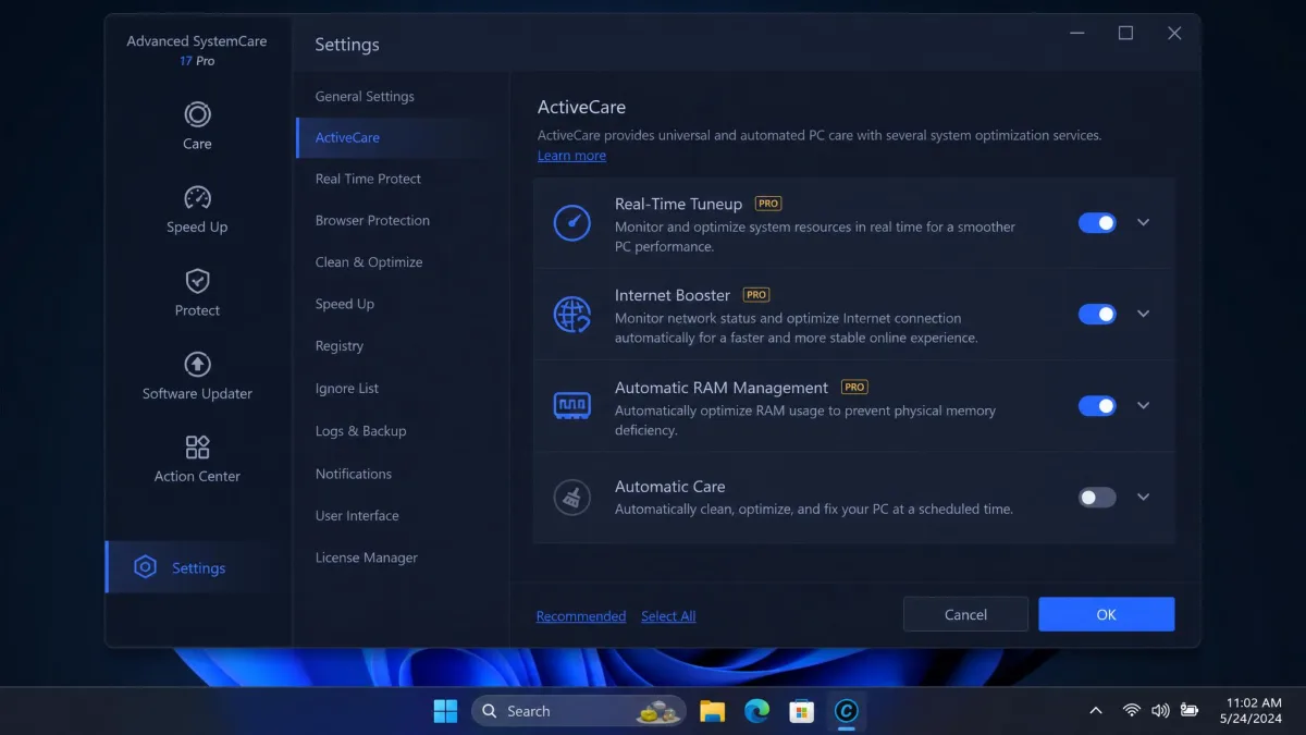 Advanced SystemCare's settings screen on Windows 11 with the module toggle list open, showing real-time tuneup, internet booster and automatic RAM management switches.