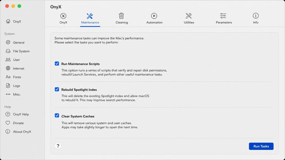 OnyX maintenance tab on an iMac with checkboxes for running scripts, rebuilding the Spotlight index and clearing system caches.