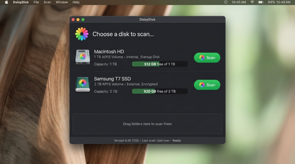 DaisyDisk's drive-selection screen on macOS Sequoia listing the internal startup disk and an external SSD, each with a Scan button and free-space readout.