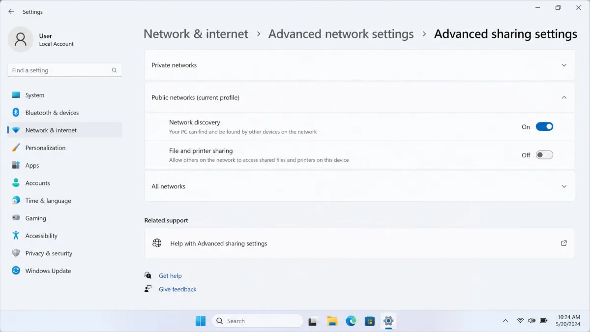 A Windows laptop network settings screen with the profile set to Public and the file and printer sharing toggle switched off.