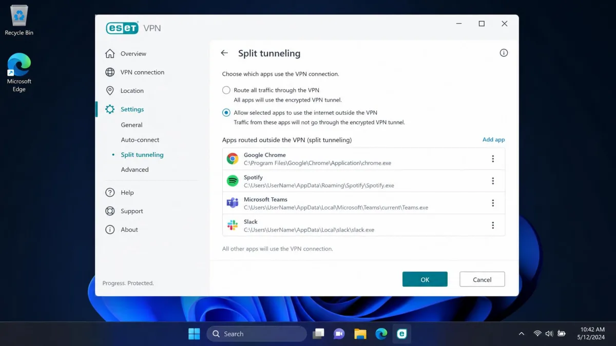 ESET VPN split tunneling settings panel listing selected apps routed outside the encrypted tunnel on a Windows desktop.