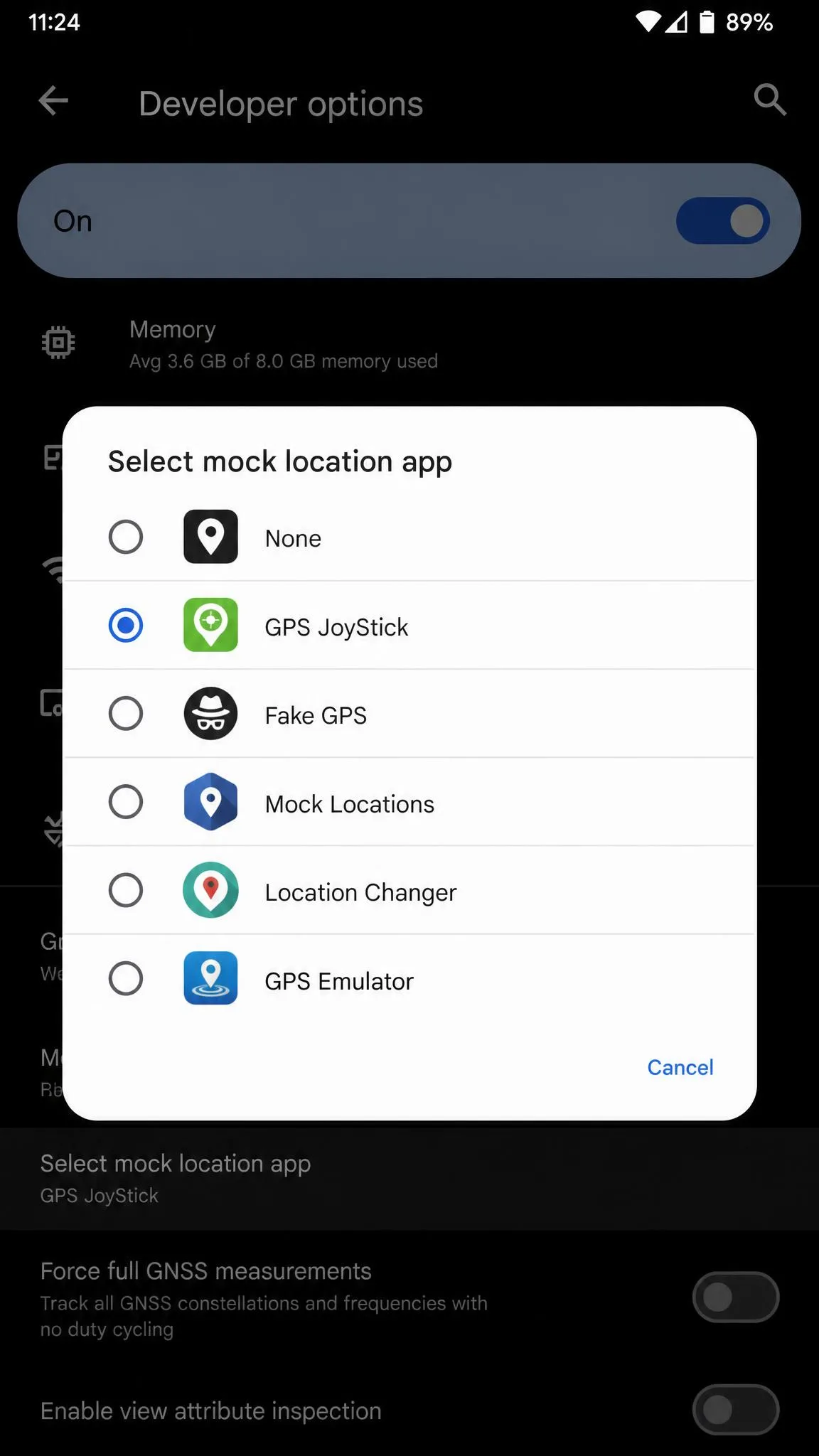 The Android Developer options screen with the Select mock location app setting open, showing a list of installed spoofing apps with one selected.