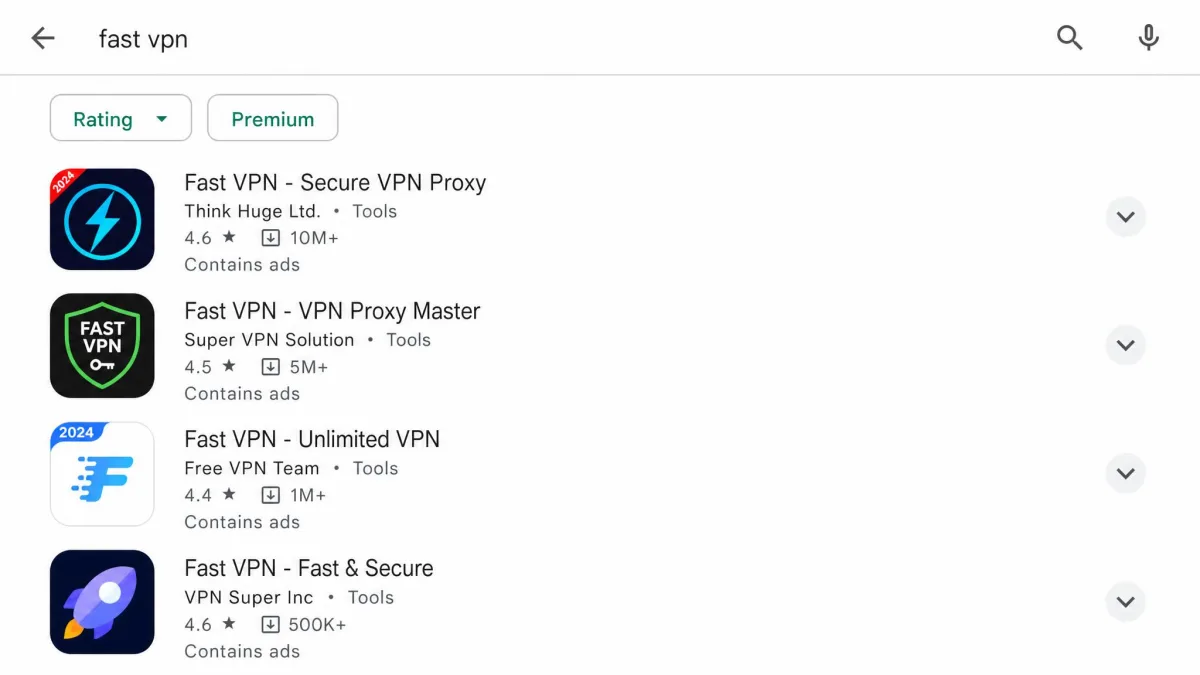 Google Play search results showing several free apps named Fast VPN from different developers, each labelled Contains ads.
