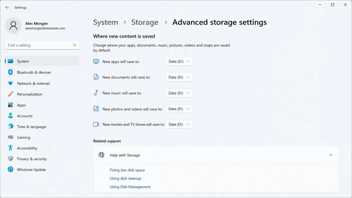 Windows 11 Advanced storage settings page showing the Where new content is saved dropdowns for apps, documents, music, photos and videos all set to a second drive labelled Data D:.