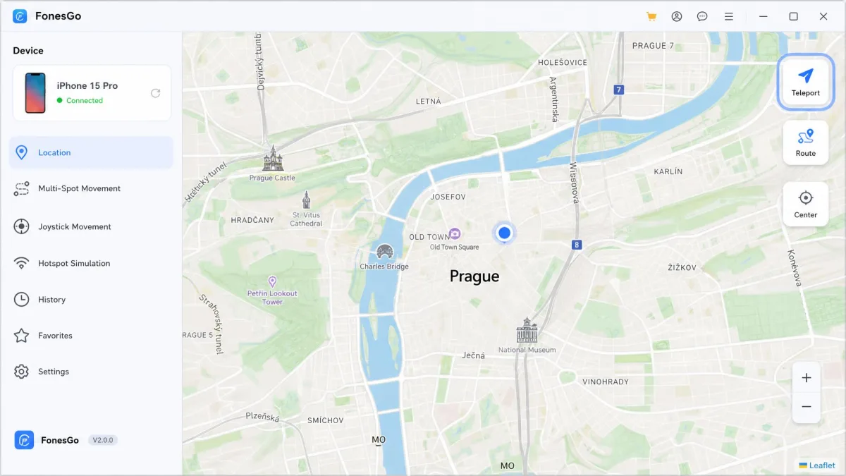 The FonesGo desktop app on Windows with an iPhone listed as connected, the map centred on a European city and the teleport button highlighted in the top right corner.