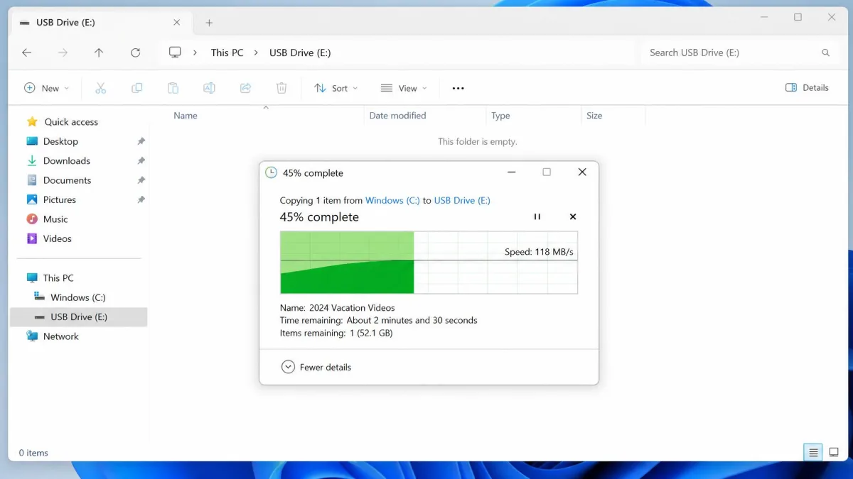 File Explorer copy dialog moving a large video folder from the C drive to an external USB drive, with a progress bar part way through.