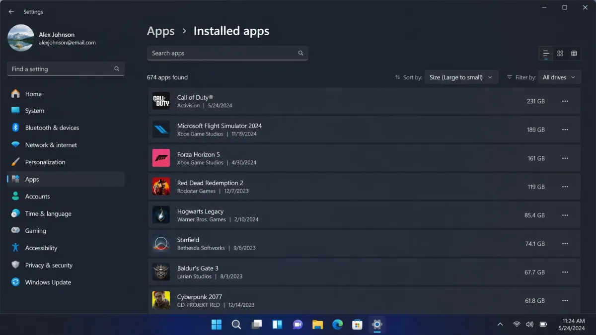 Windows 11 Installed apps page sorted by size, with large games at the top of the list and their sizes in gigabytes.