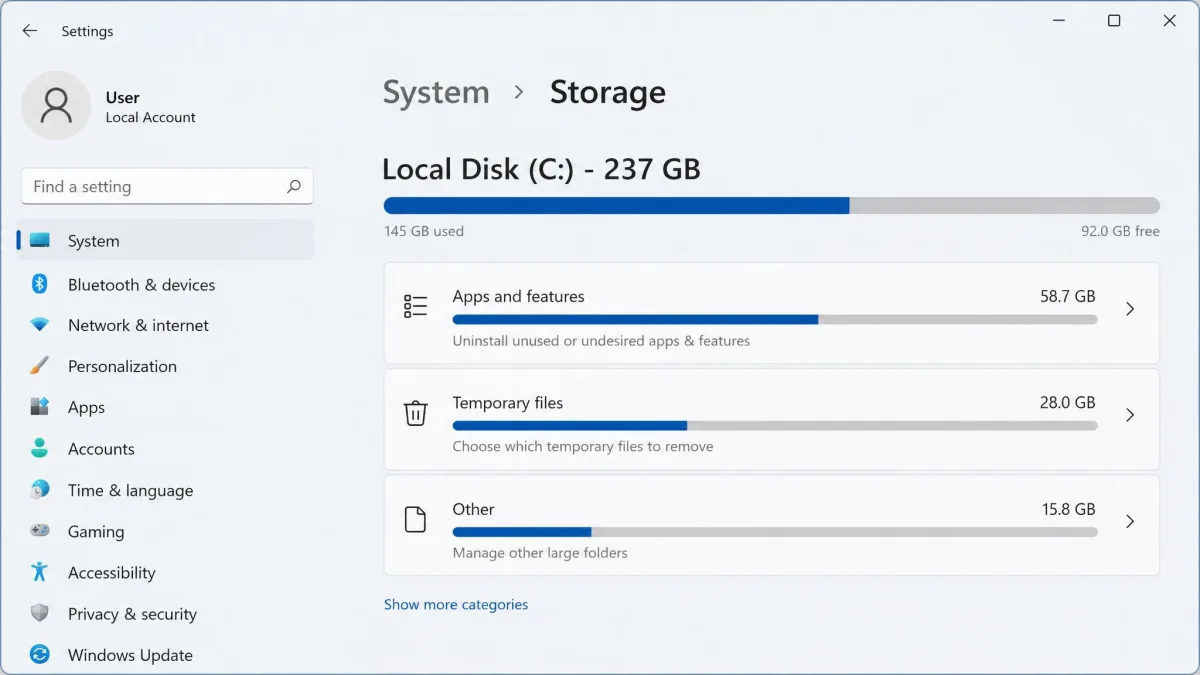 Windows 11 Settings Storage page showing the usage bar and category list with Apps and features, Temporary files, and Other.