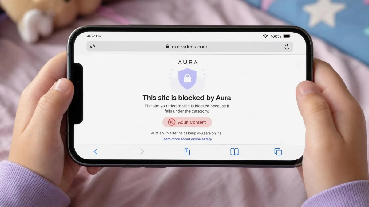 A child's phone screen showing Aura blocking an adult-content website with its VPN filter, displaying the blocked-category notice in the browser.