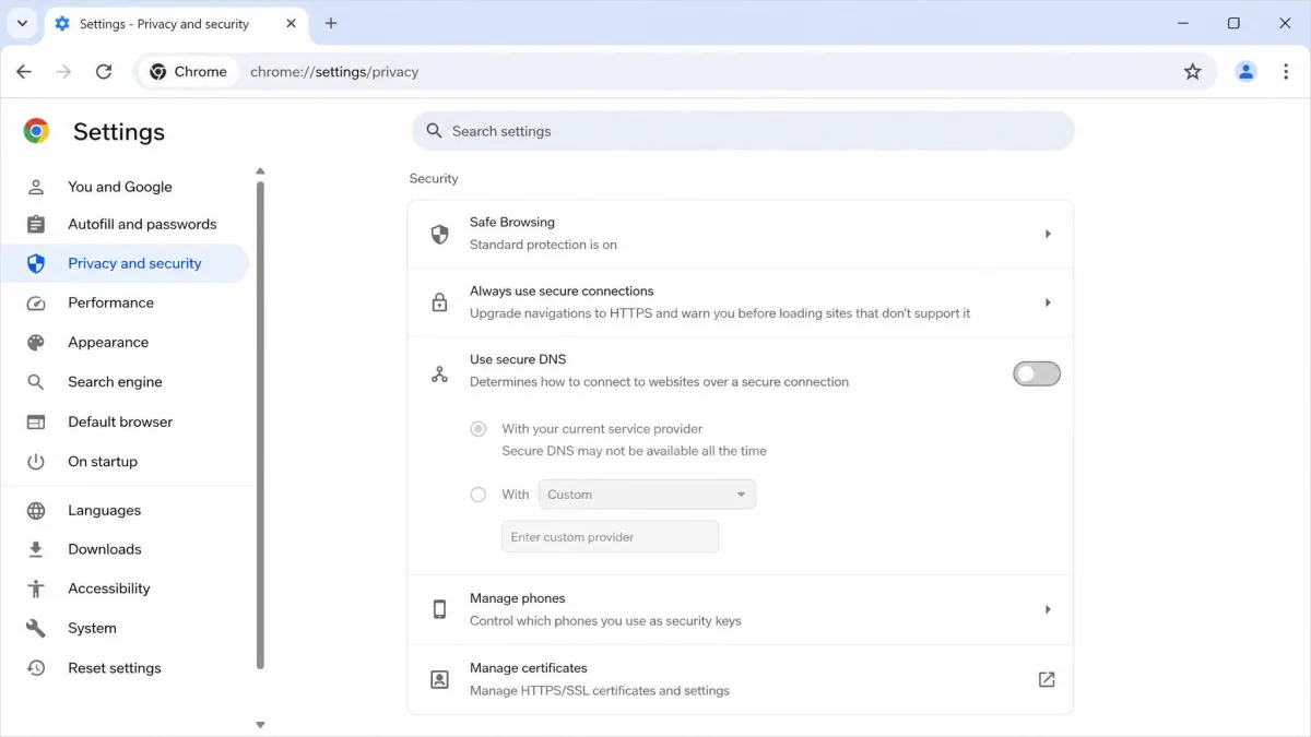 Chrome privacy and security settings showing the Use secure DNS option toggled off to keep DNS lookups inside the VPN tunnel.