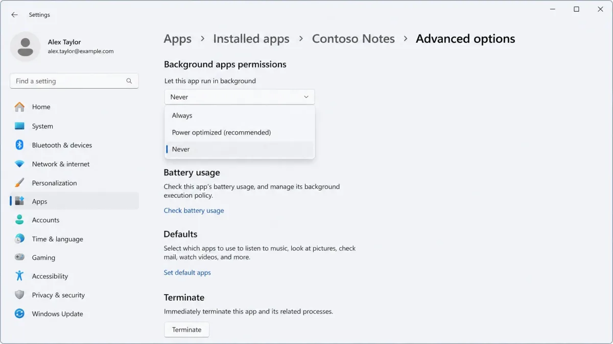 The advanced options page for a Windows 11 app with the background apps permission dropdown open and Never selected.
