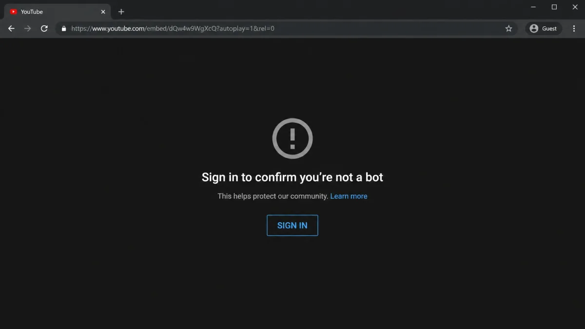 A browser address bar showing a YouTube embed URL beside a full-screen player area displaying the sign-in required message instead of video playback.