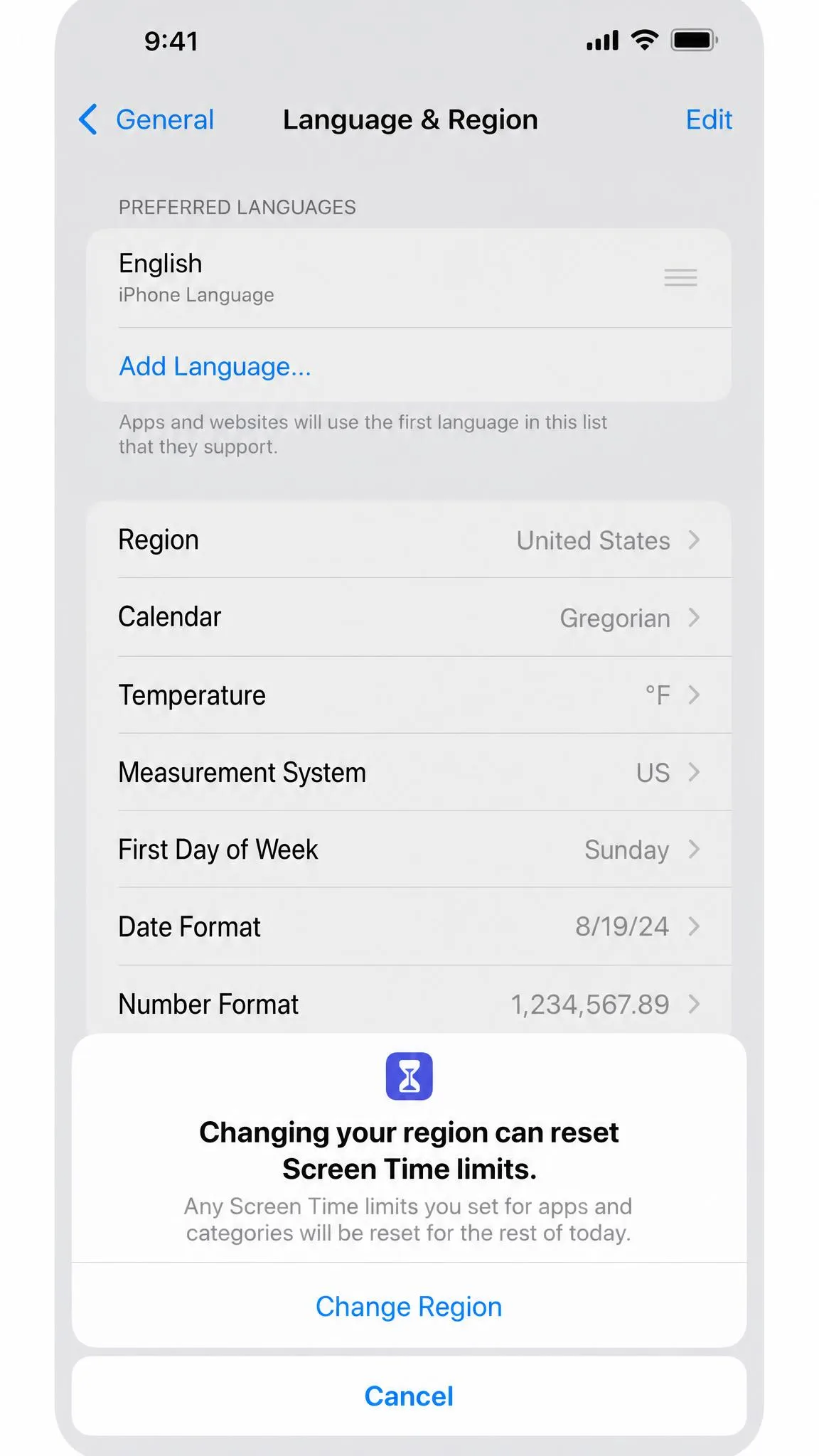 The iPhone Language & Region settings screen, showing how a region change can reset Screen Time limits for the rest of the day on iOS 18.