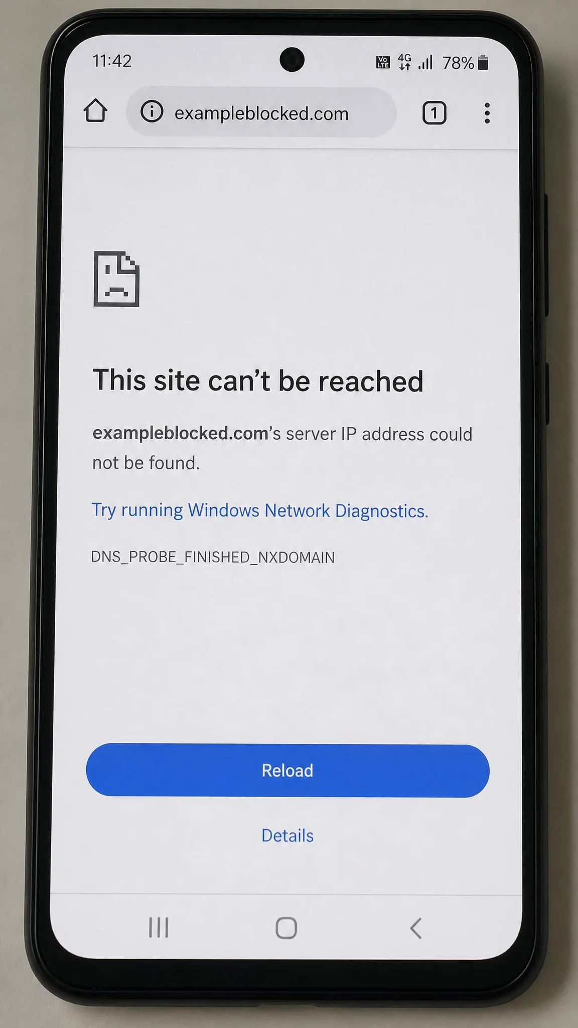 An Android phone showing a site-cannot-be-reached error page for a DNS-filtered domain, with the mobile data icon active in the status bar.
