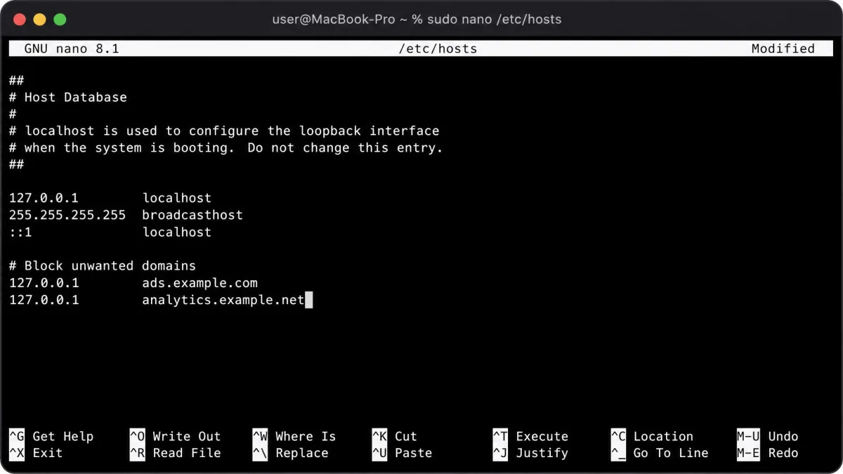 A macOS Terminal window running sudo nano /etc/hosts with two 127.0.0.1 blocking lines added at the end of the file.