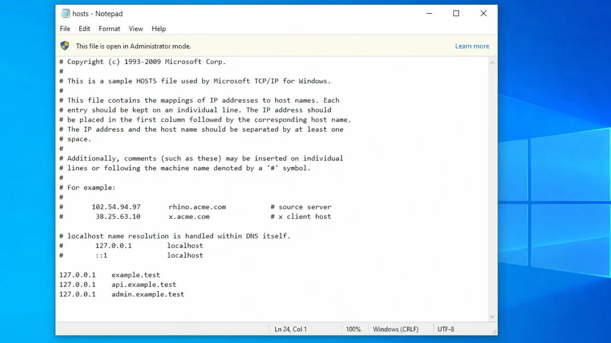 The Windows hosts file open in Notepad running as administrator, showing three 127.0.0.1 entries added at the bottom of the file.