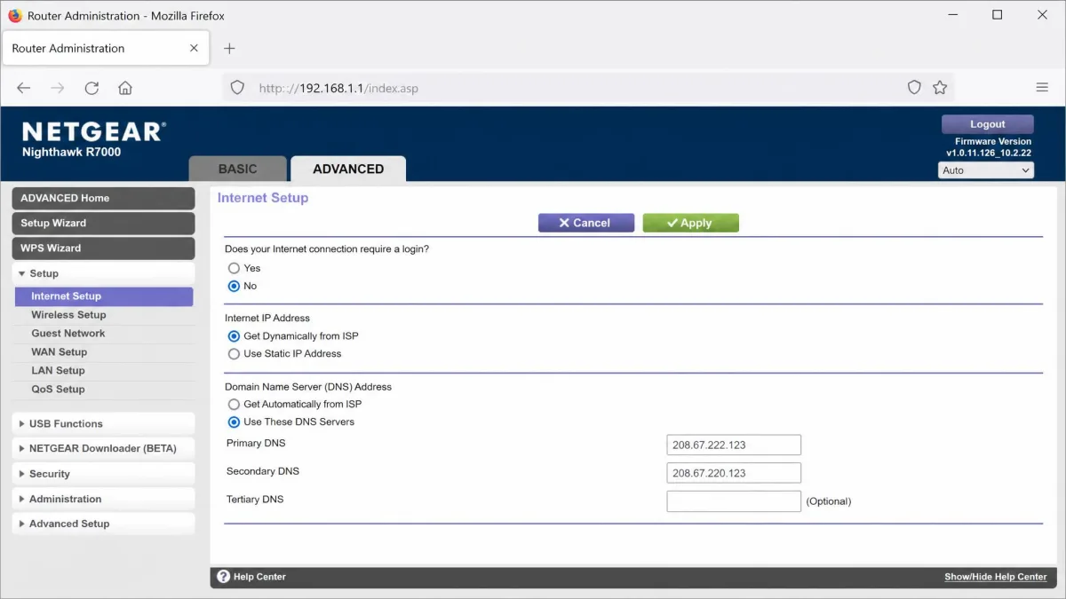 A home router admin page in Firefox with the primary and secondary DNS fields filled in with the OpenDNS FamilyShield addresses.