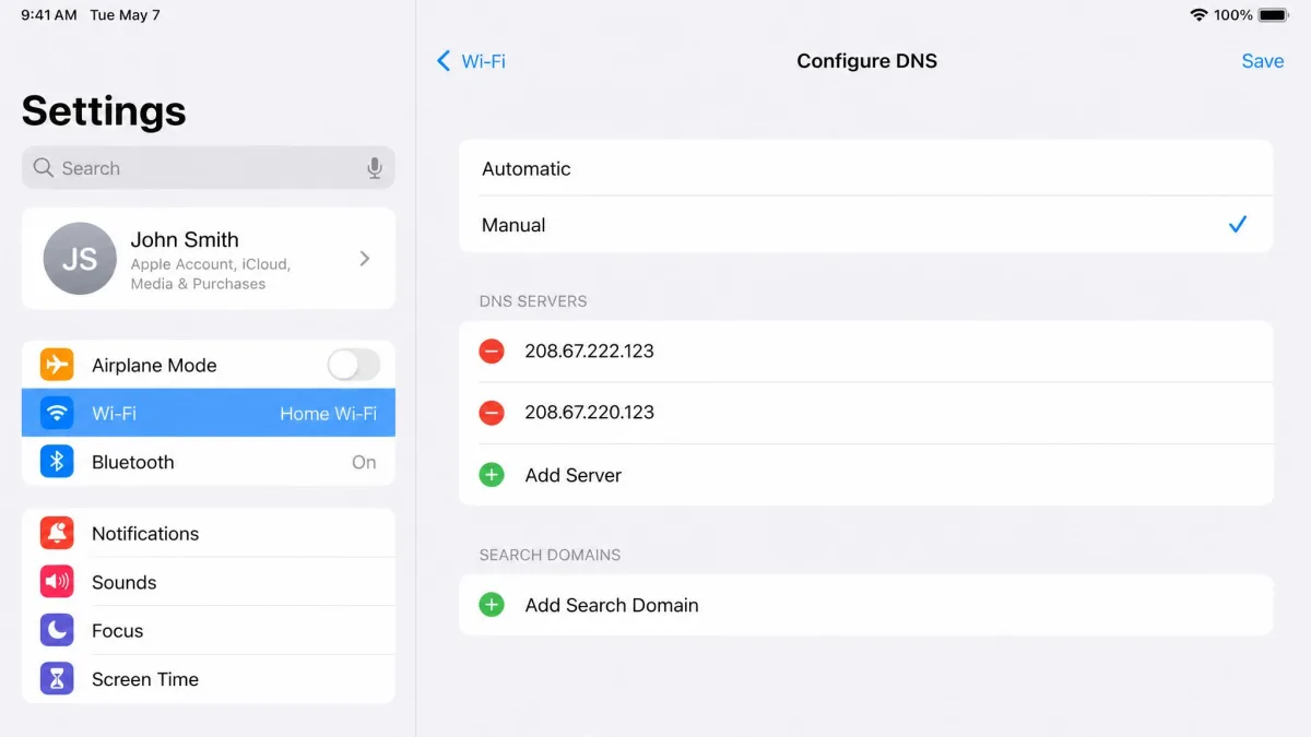 iPad Wi-Fi settings on the Configure DNS screen set to Manual, with the two OpenDNS FamilyShield server addresses entered in the list.