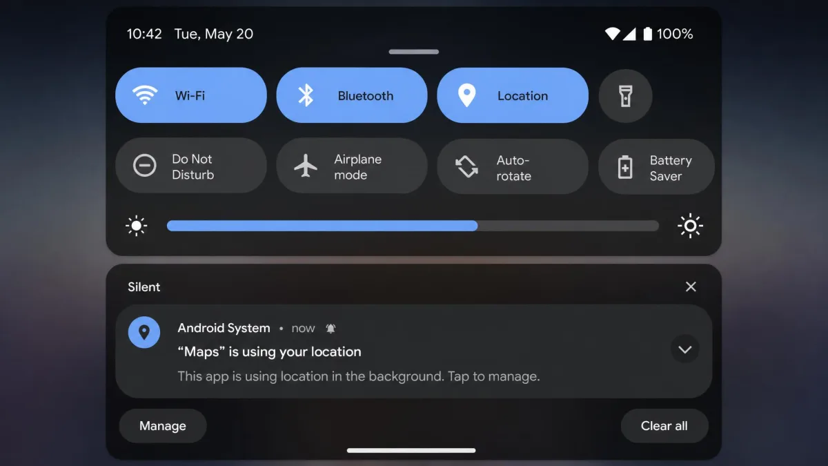 The Android quick settings panel pulled down showing the Location tile switched on next to Wi-Fi and Bluetooth tiles, with a notification about an app using location in the background.
